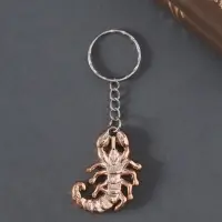 Брелок пластик под металл "Скорпион" золото 4х2,6 см