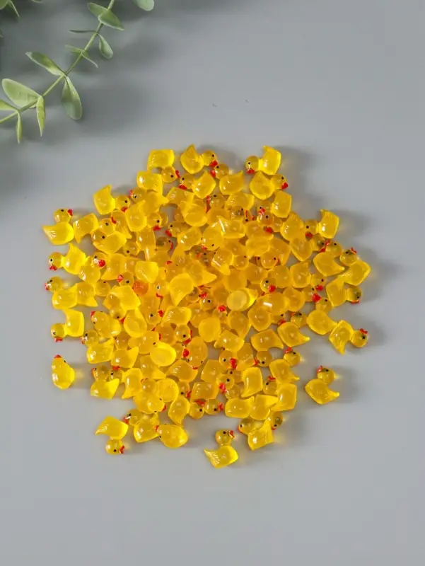 Сувенир полистоун флюоресцентный "Уточки" набор 100 шт 1,5х1,5 см