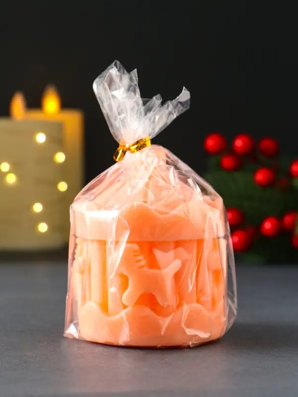 Свеча новогодняя "Карусель с лошадками" 60х80 мм, персиковый