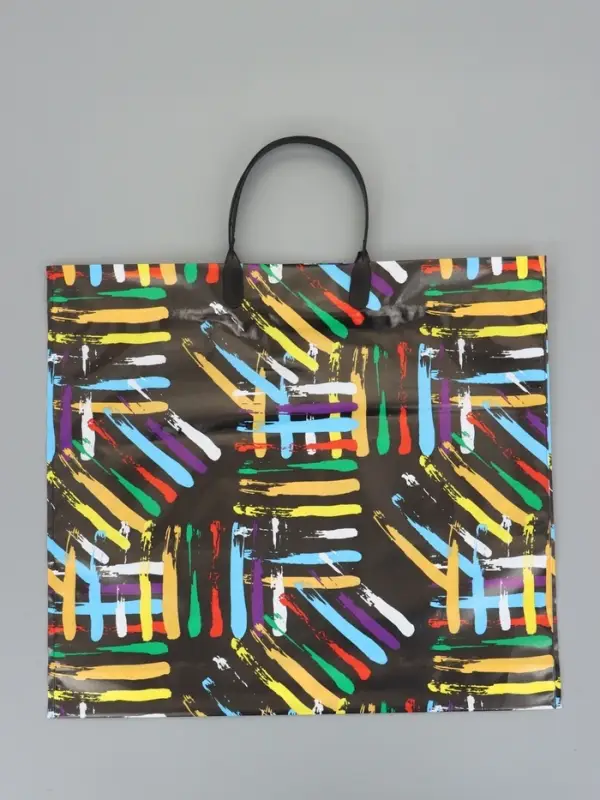 Пакет "Цветные линии", полиэтиленовый с пластиковой ручкой, 38 х 34 + 3 см, 90 мкм