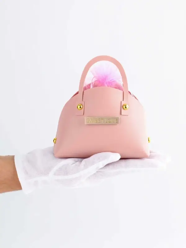 Кожанная подарочная сумочка 14 х 6,5 х 12,8 см розовая