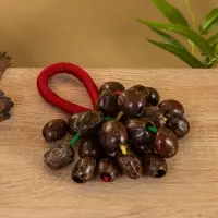 Сувенирный музыкальный инструмент "Погремушка" орех кемири, 16х10х3 см, МИКС