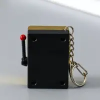 Брелок пластик "Игровой автомат - казино" золото 2,7х3,4х5 см