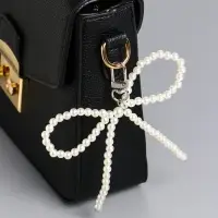 Брелок на карабине "Жемчужный бант" бусины d=0,8 см 9,5х11х1,6 см