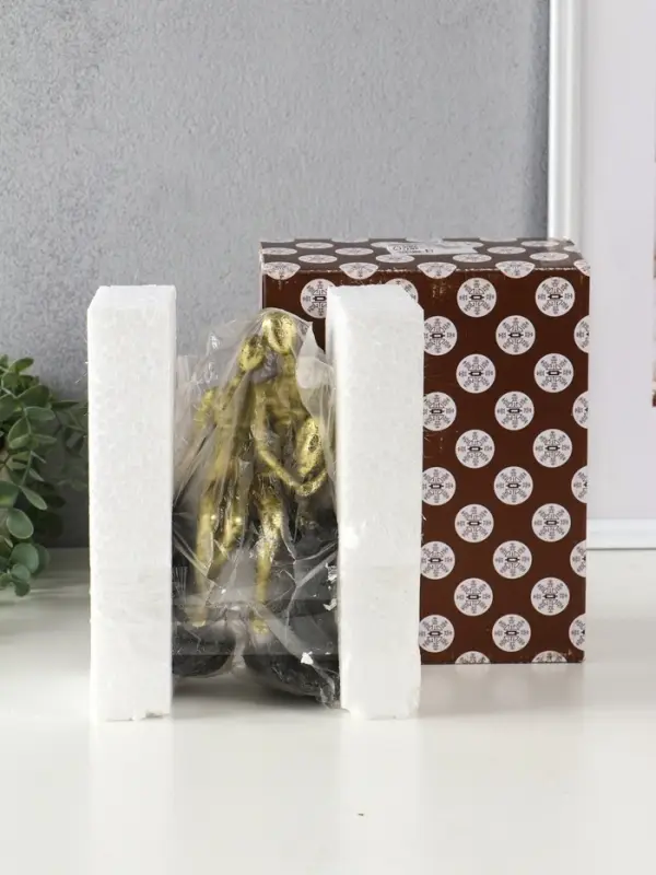 Сувенир полистоун "Абстракция. Парочка на скамейке" золото с серым 15,5х7,5х20,5 см