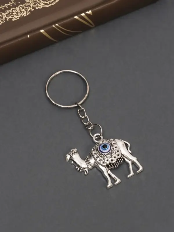 Брелок металл глазки "Верблюд" 3х3 см