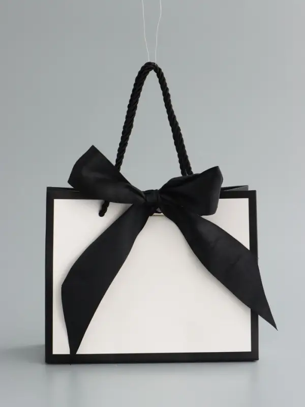 Пакет подарочный, белый, с бантом, 19 х 15 х 7 см