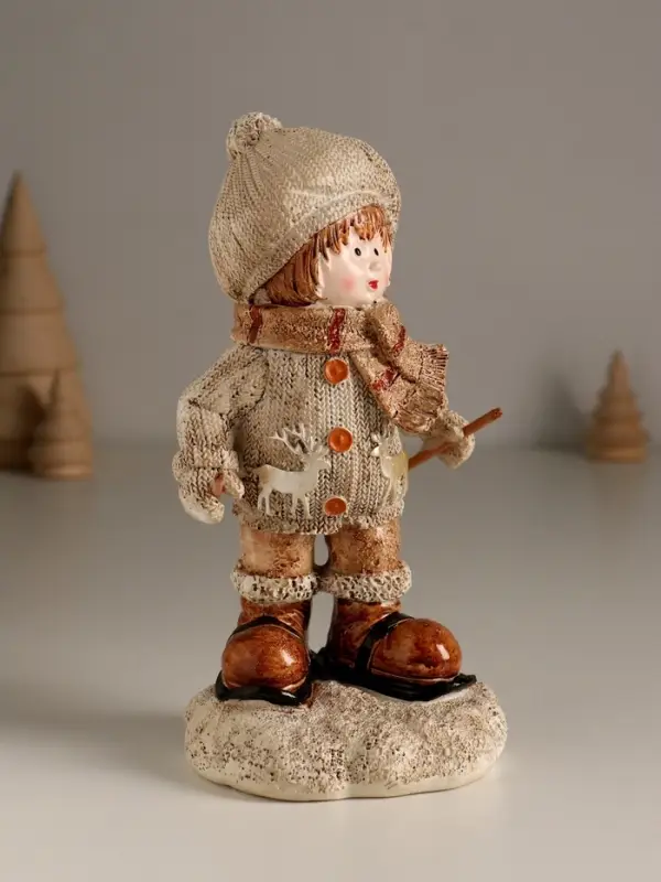 Сувенир полистоун "Малыш в вязаном наряде на мини-лыжах" 8,5х8х17,5 см