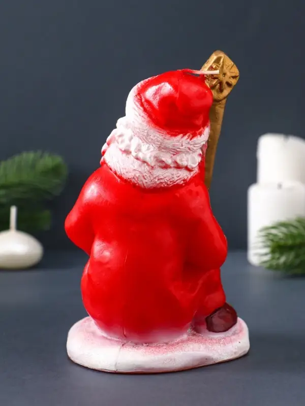 Свеча фигурная "Дед Мороз с мешком" 9х9,5х16 см