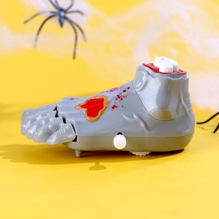 Игрушка заводная "Нога"