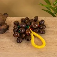 Сувенирный музыкальный инструмент "Погремушка" орех кемири, 16х10х3 см, МИКС