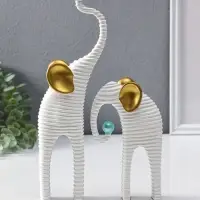 Сувенир полистоун "Слоны. Гофре" белый с золотом набор 2 шт 5х10х16,5 5,5х16,5х29,5 см