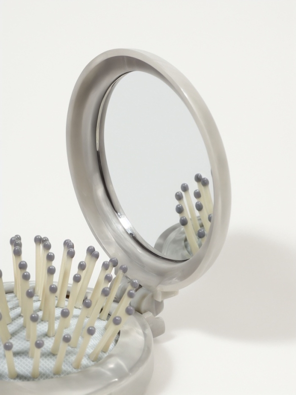 Расческа массажная складная круг МРАМОР d7/7,5*7*2,5см пластик серый пакет QF