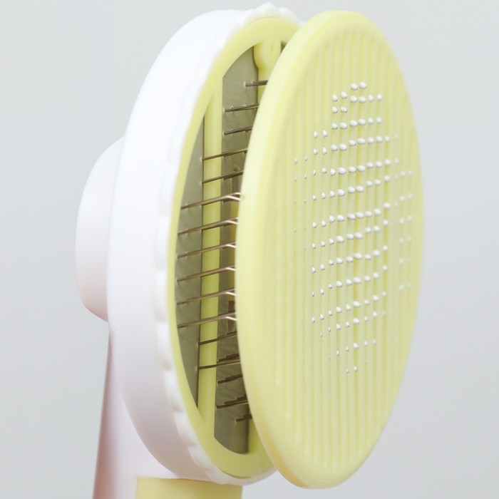 Пуходёрка пластиковая с функцией самоочистки, 7,7 х 19,1 см, жёлтая