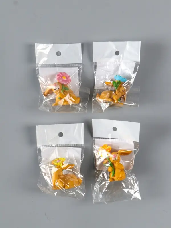 Сувенир полистоун "Заяц с яркой ромашкой" МИКС 2,5х3,8х4,4 см