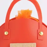 Кожанная подарочная сумочка 14 х 6,5 х 12,8 см оранжевая