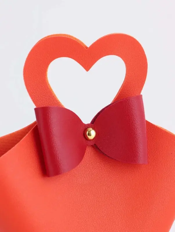 Кожанная подарочная сумочка 10,5 х 5 х 6 см оранжевая