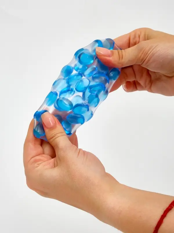 Мялка "Шар с камушками", цвета МИКС