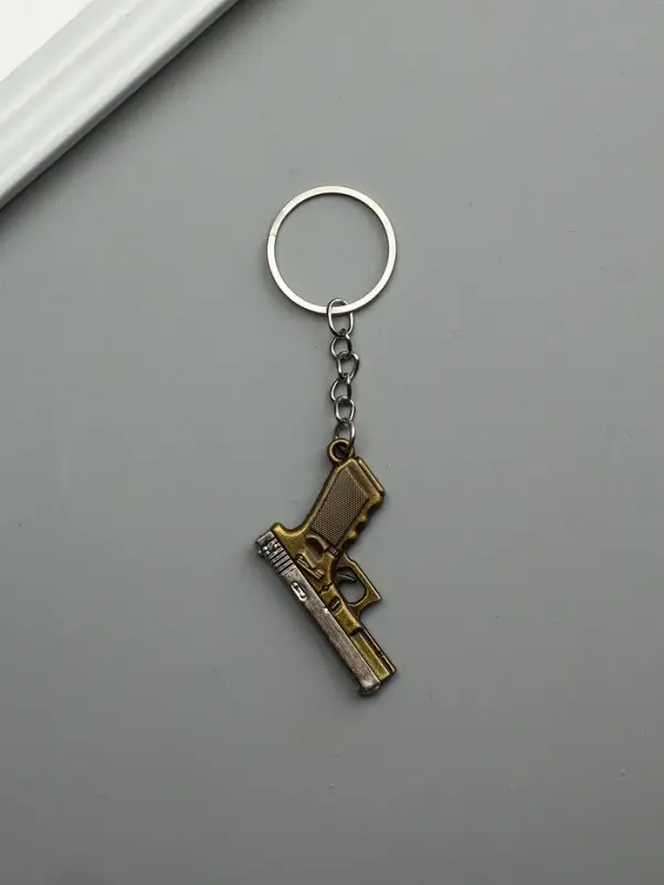 Брелок металл "Пистолет" двигается затвор МИКС 3х4,3х0,5 см