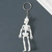 Брелок пластик "Скелет в бандане" белый 10х3,5х1 см