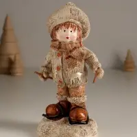 Сувенир полистоун "Малыш в вязаном наряде на мини-лыжах" 8,5х8х17,5 см