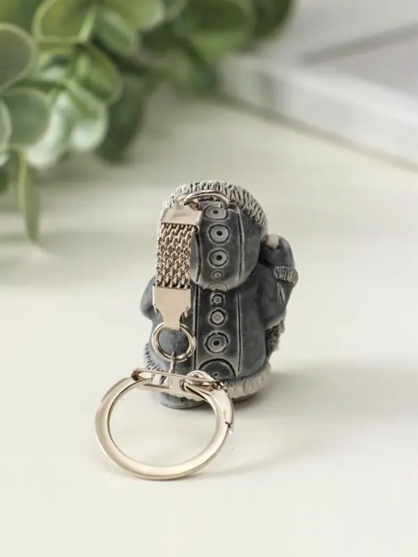 Брелок "Хант с вязанкой рыбы маленький" 4,1 см