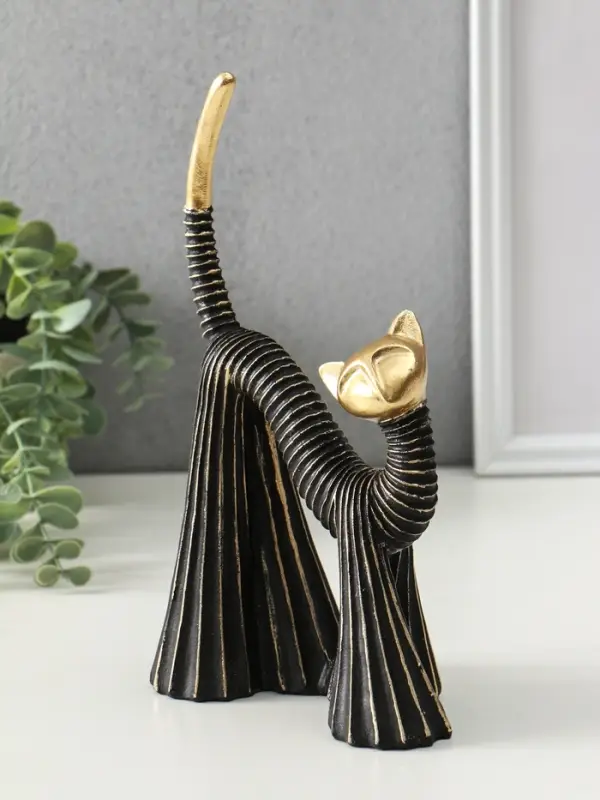 Сувенир полистоун "Кошка в клёшах" чёрно-золотая 7,5х15х25 см