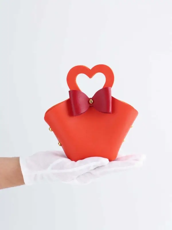 Кожанная подарочная сумочка 10,5 х 5 х 6 см оранжевая