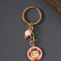 Брелок металл, эмаль "Девочка и леденец" 9 см