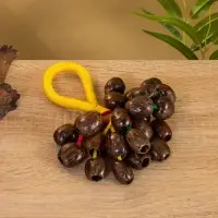 Сувенирный музыкальный инструмент "Погремушка" орех кемири, 16х10х3 см, МИКС