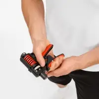 Эспандер кистевой пружинный Motive Power, черный с красным