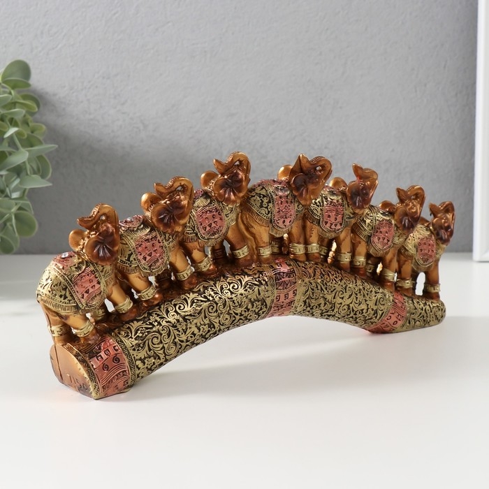 Сувенир полистоун "Семь африканских слонов в золотой, ажурной попоне" 10,7х29х4 см