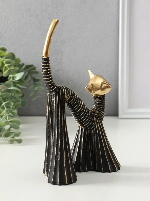 Сувенир полистоун "Кошка в клёшах" чёрно-золотая 7,5х15х25 см