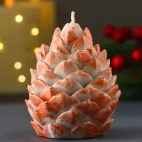 Свеча "Шишка 80х60 мм с оранжевым декором