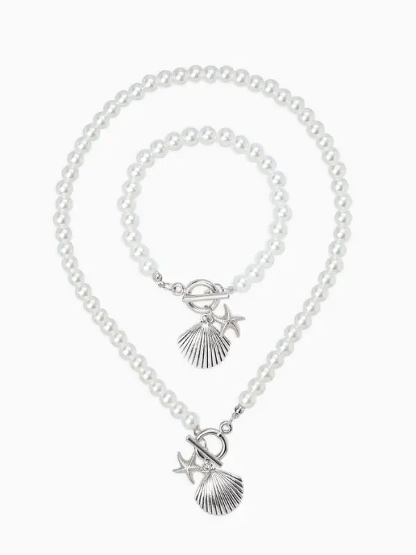 Набор 2 пред-та: бусы.браслет "Жемчуг", ракушка вонголе, цвет белый в серебре L=18/42см №8   1093654