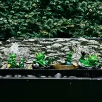 Садовая фигура 14 х 13 х 9,5 см "Лягушка на шине" Водоплавающая