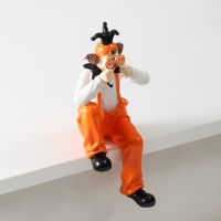 Сувенир полистоун "Клоун с леденцами, сидит" бело-оранжевый 10х9,5х20 см