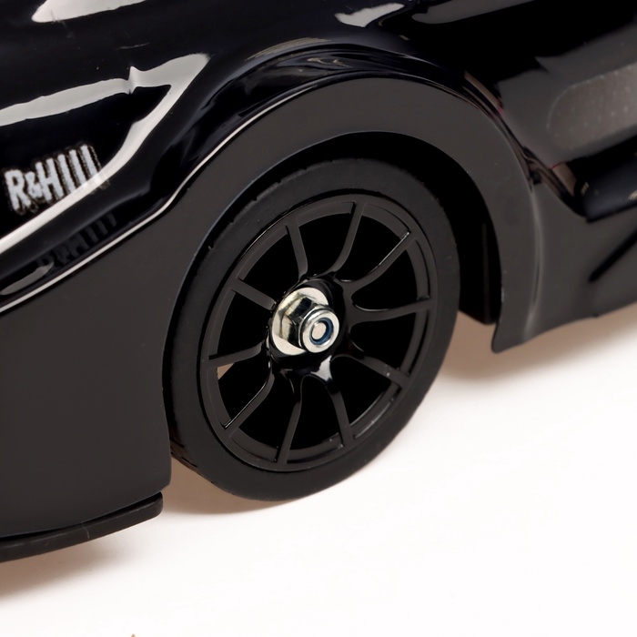 Машинка на пульте управления &laquo;Легенда Дрифта&raquo;, радиоуправление, полный привод, 40 км/ч, 2 комплекта колёс, 1:16, цвет чёрный