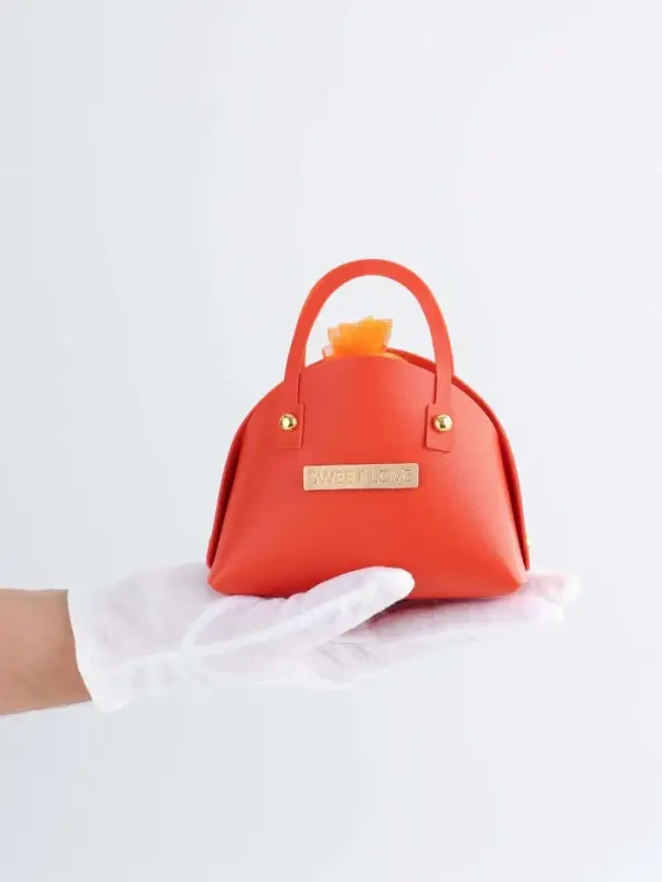 Кожанная подарочная сумочка 14 х 6,5 х 12,8 см оранжевая