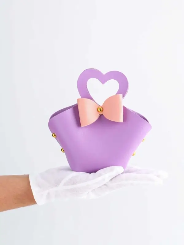 Кожанная подарочная сумочка 10,5 х 5 х 6 см сиреневая