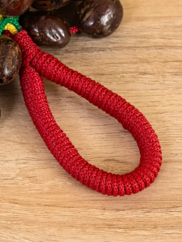 Сувенирный музыкальный инструмент "Погремушка" орех кемири, 16х10х3 см, МИКС