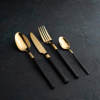 Набор столовых приборов из нержавеющей стали Magistro &laquo;Версаль&raquo;, 4 предмета, цвет ручек чёрный, цвет металла золотой