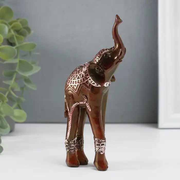 Сувенир полистоун "Слон на длинных ногах, попона с серебристыми узорами" 15х6,5х4 см