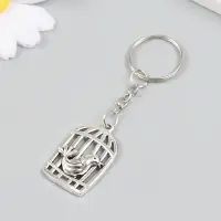 Брелок металл "Птица у клетки" серебро 2,2х3,6 см