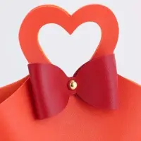 Кожанная подарочная сумочка 10,5 х 5 х 6 см оранжевая