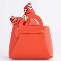 Кожанная подарочная сумочка 13 х12 х 5,5 см оранжевая