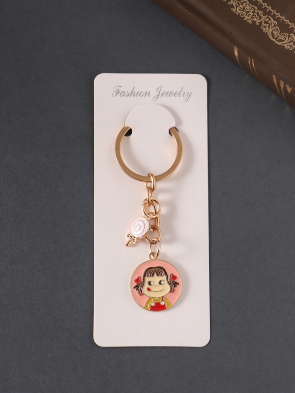 Брелок металл, эмаль "Девочка и леденец" 9 см