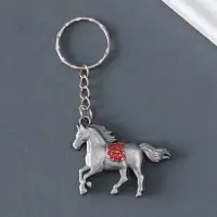 Брелок металл "Бегущий конь со стразами на седле" МИКС 3х4,2х0,8 см