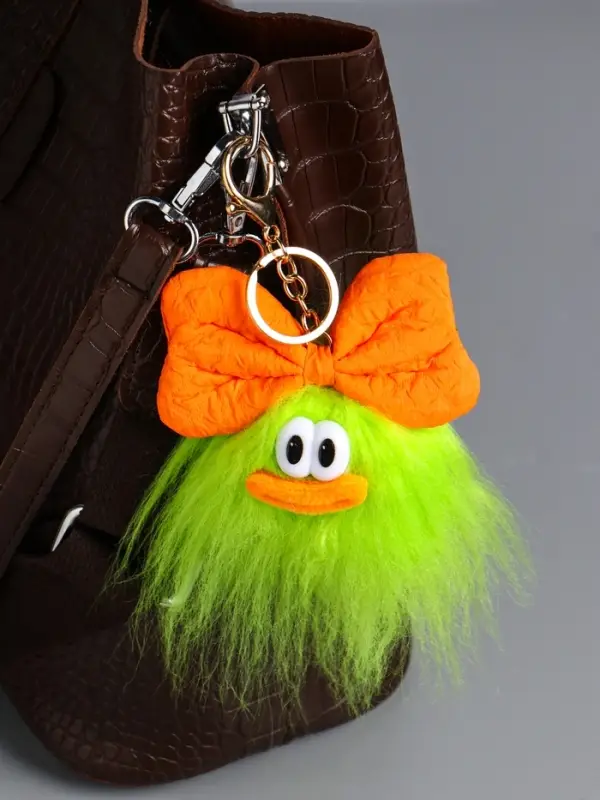 Пушистик на кольце "Чучундра с бантиком" салатовая 18х10х5 см