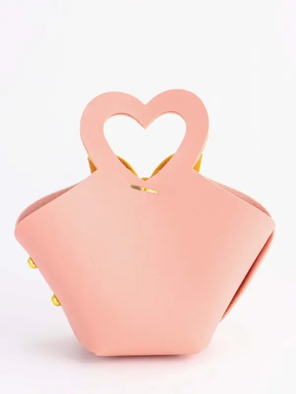 Кожанная подарочная сумочка 10,5 х 5 х 6 см розовая